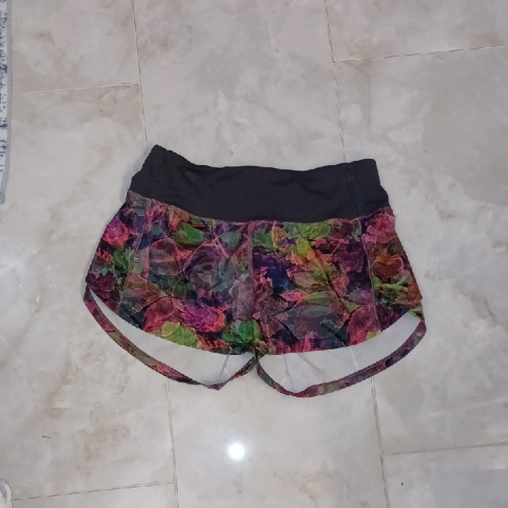 Pink and Green Athletic Shorts with Floral Pattern